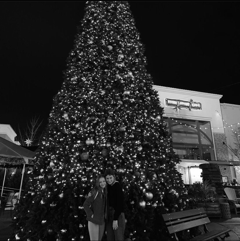 Young Siona Ruud and Alina Jakobson visiting the Bridgeport Christmas Tree. This tree is a staple of many people's holiday traditions, since it in in the center of Bridgeport Village, where many people do their holiday shopping.