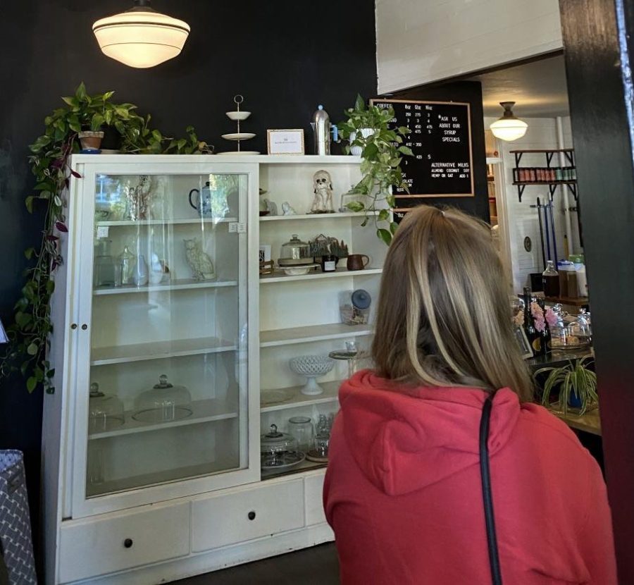 Waiting in line at Maplewood, a small coffeeshop in the Maplewood neighborhood in Portland. The coffeeshop offers a variety of different coffee's and tea's with their own homemade flavoring. 