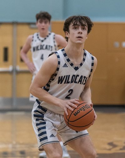 Enzo Chimienti shoots a free throw in the championship game agaisnt Crescent Valley. Chimienti and teammate Logan Thieby have both stepped into their roles as team leaders as the Cats' head into the season.