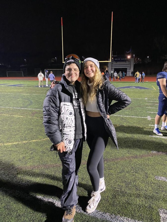 Sydnie and Miguel demonstrating school spirit at Wilsonvilles football game! This is one of the many activities they enjoy doing together!