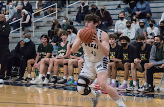 Senior Kellen Hartford with a pump fake. Cats went on to win 61-26.