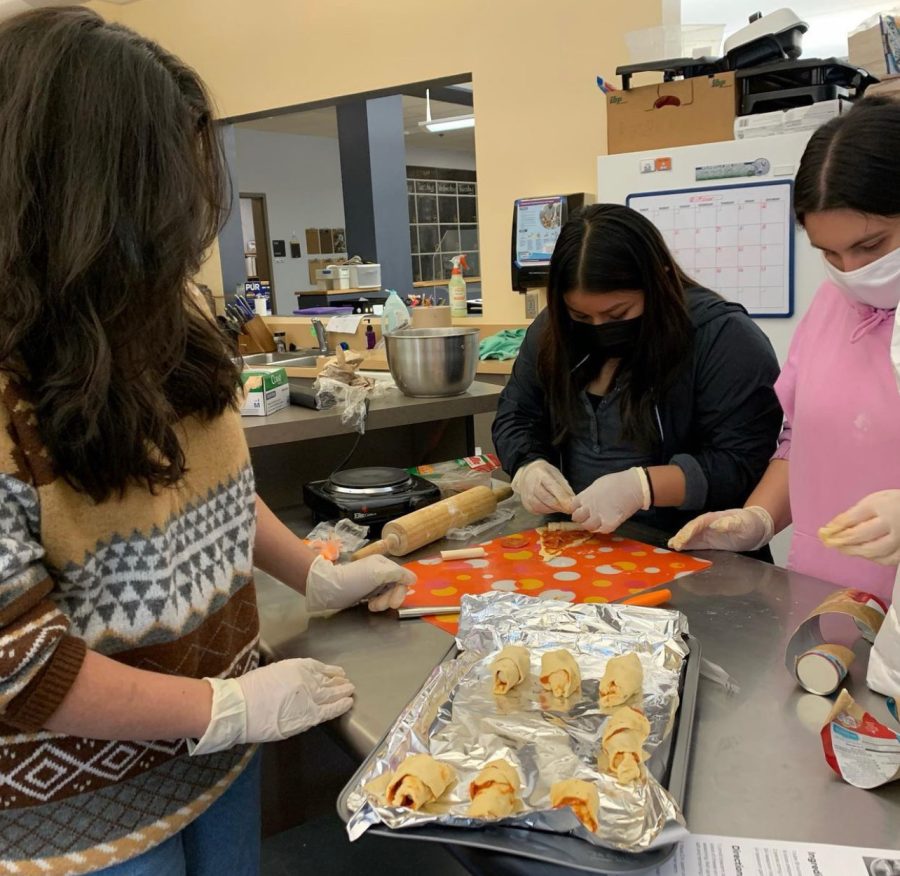 Students in culinary arts finishing making pizza rolls. Photo provided by @wvhs_culinary on instagram.