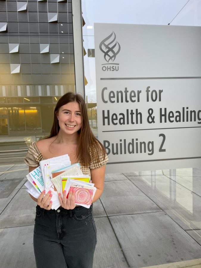 President Payton Saige standing outside of OHSU. She dropped off the letters made by the club!