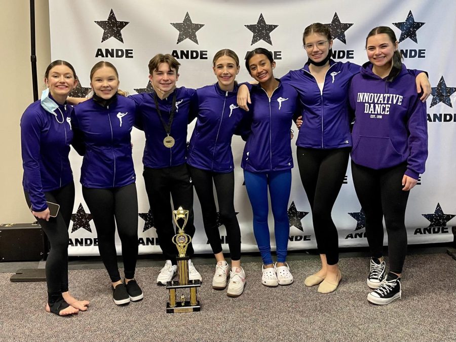 Dancers celebrate success after performing
 at the "A New Dance Experience" dance competition. 
