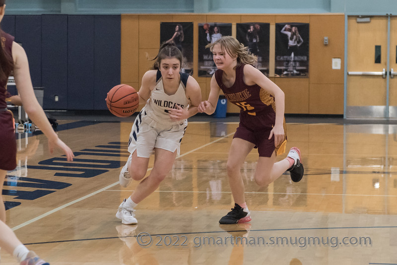 Senior Karina Borgen gets past her defender. Wilsonville won 47-44 over Milwaukie. 