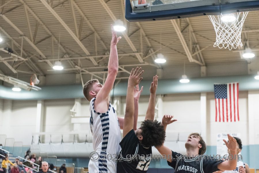 Logan Thebiay takes a shot against Parkrose. He scored 19 points in the senior night victory.