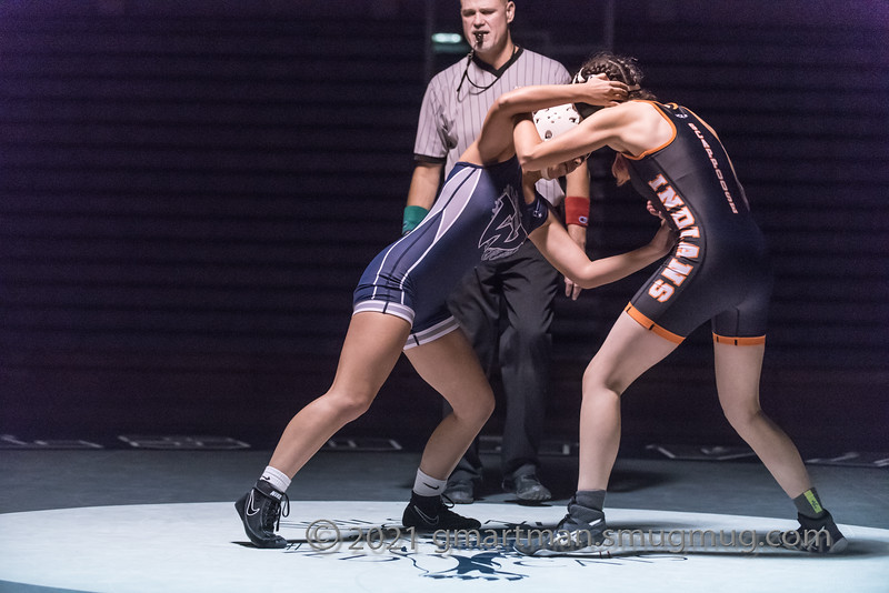 Sky Welborne, junior, puts pressure on her opponent.