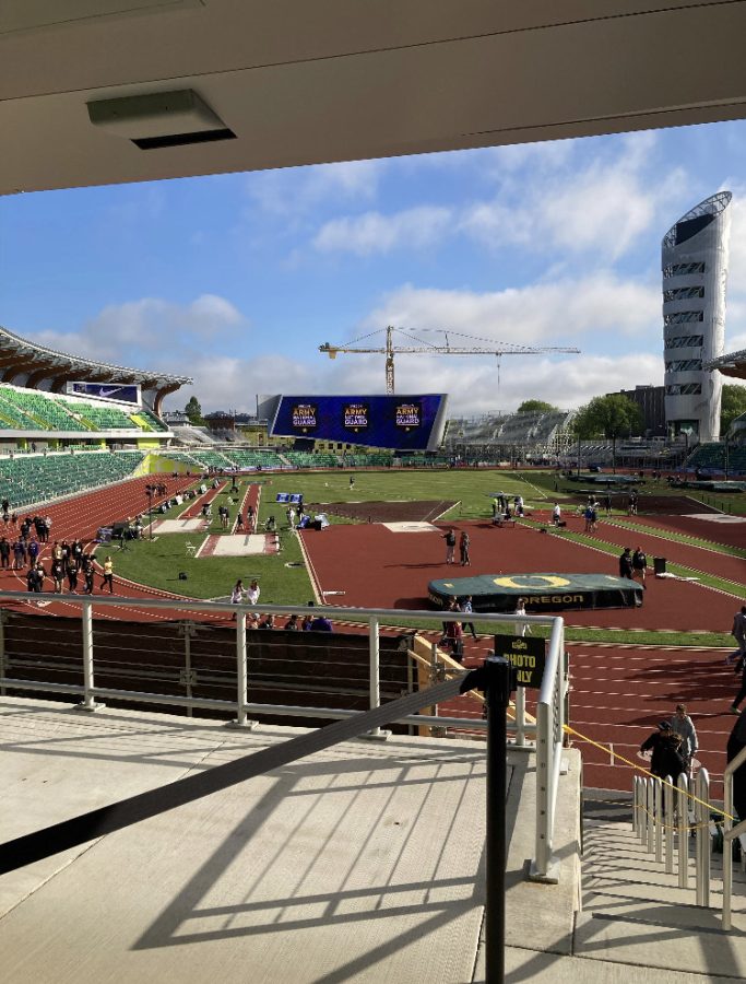 Picture taken of University of Oregon's Hayward Field from photographer Ben McClelland's point of view upon entering. 
The new Hayward Field facility was roughly $270 million to upgrade. The athletes that qualify for this meet get to compete on the same field as Olympians do. 