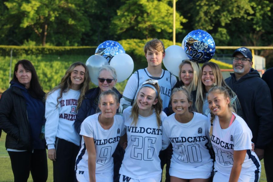 The four seniors and their families.