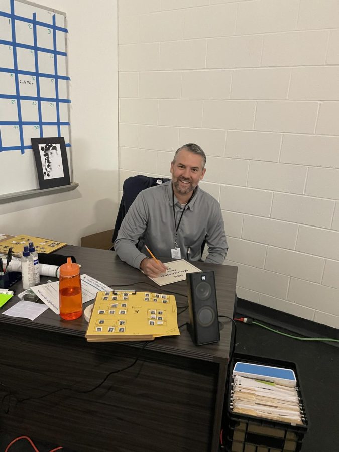 Mr. Lunden works hard at his desk. He is excited to take over as WVHS' graphic arts teacher!