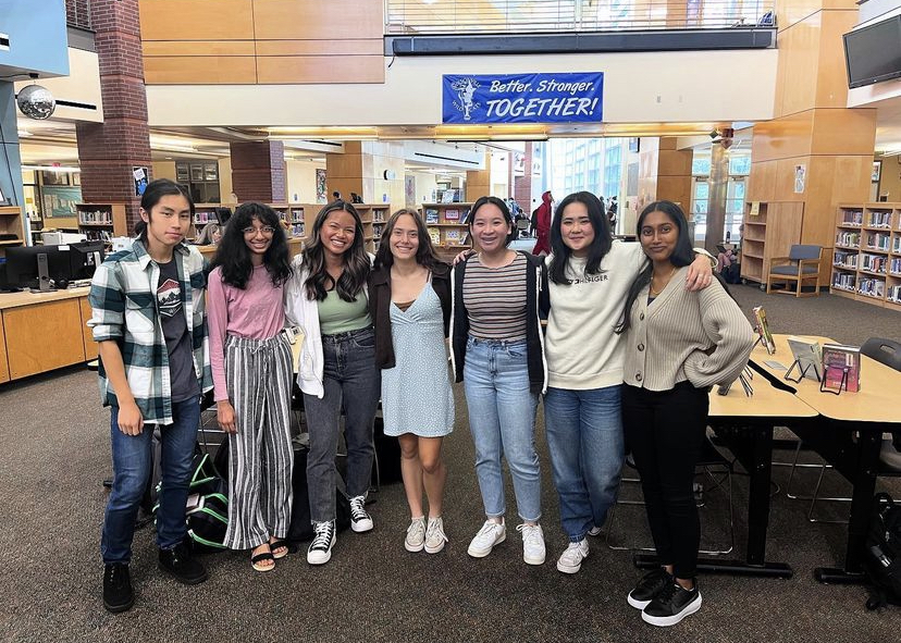 API Club board and club members posing before club fair. They successfully gained new members and are excited for the new year.