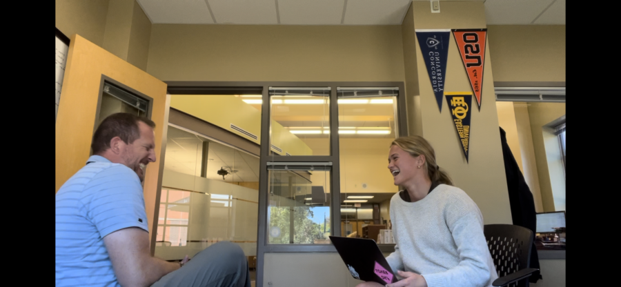 New Athletic Director, Josh Davis, having a laugh in the office. McIlmoil was mid-interview when photo was taken. Photo provided by author. 