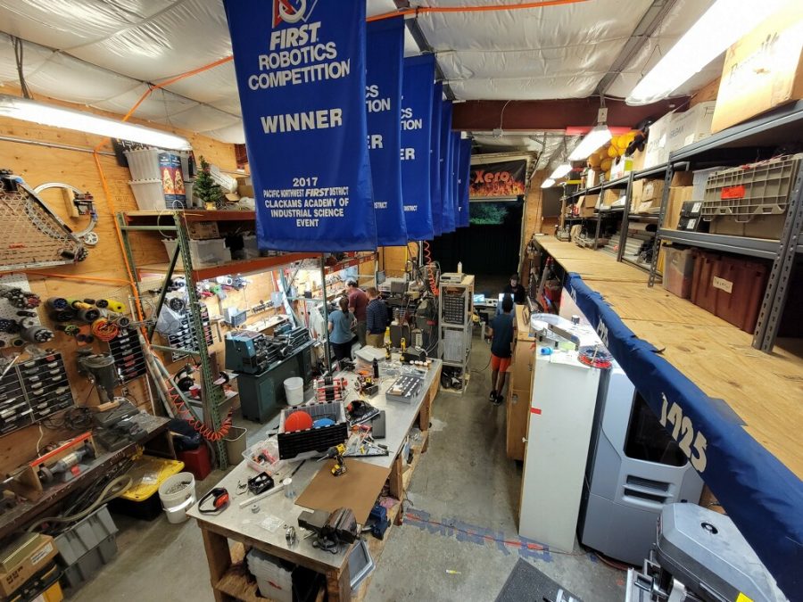 students working in the robotics shed