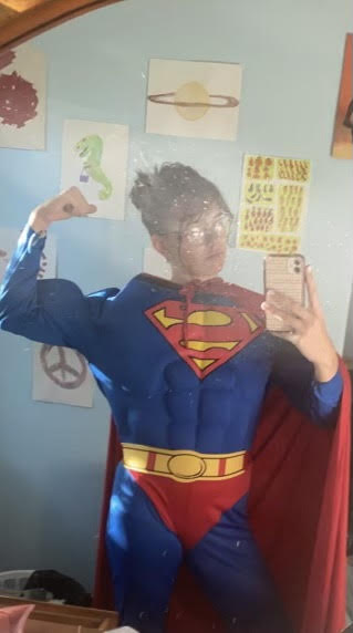 Lauren Thomas, sophomore, sports her superman attire for Halloween. She can't wait to save the world on the 31st!