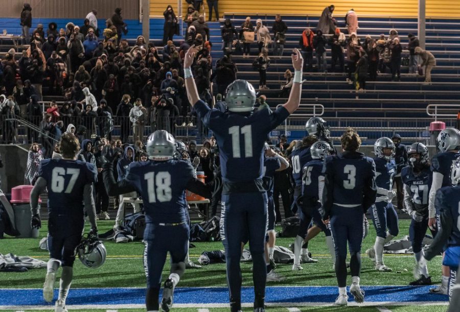 Junior QB Kallen Gutridge hypes up the crowd after a Playoff Semifinal win.