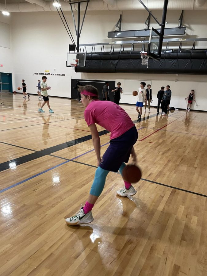 Luke Larson takes a through the legs dribble on the sideline swiftly. A move he’s replicated in game many times. 