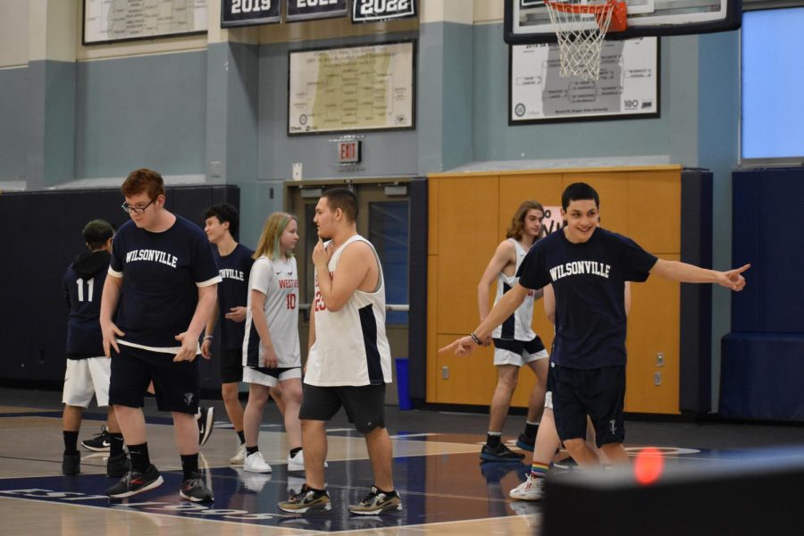 Eduardo Peña Perez celebrates after making a basket. He was the leading scorer for his team in this game. 