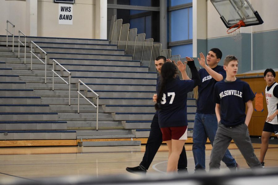 Yessi Florez and Paul Good celebrate after making a shot! Their teamwork really benefited the team throughout the game. 