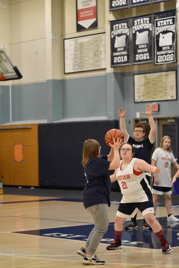 Lucy May looks to pass the ball to one of her teammates. Westview had solid defense throughout the game. 