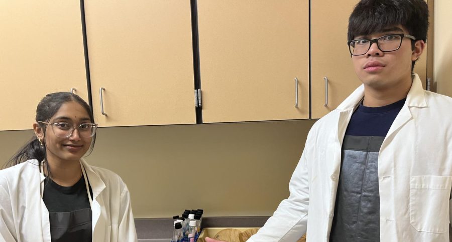 Sameera Latham (right) and CJ Chan (left) work in the lab on their project. They have been exploring methods of research and staring their experiments in "lab hours" after school. 