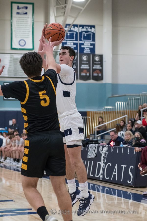 Junior Guard Kallen Gutridge pulls up from 3 vs Milwaukie. Wilsonville hosts La Salle Prep Friday, January 20th.