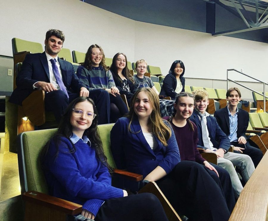 Wilsonville High School's Speech and Debate team smiles for the camera. This was one of their most recent competitions.