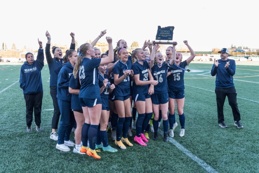 Wilsonville's Girls team celebrating their second straight state championship. Would they have the same success in 6A?