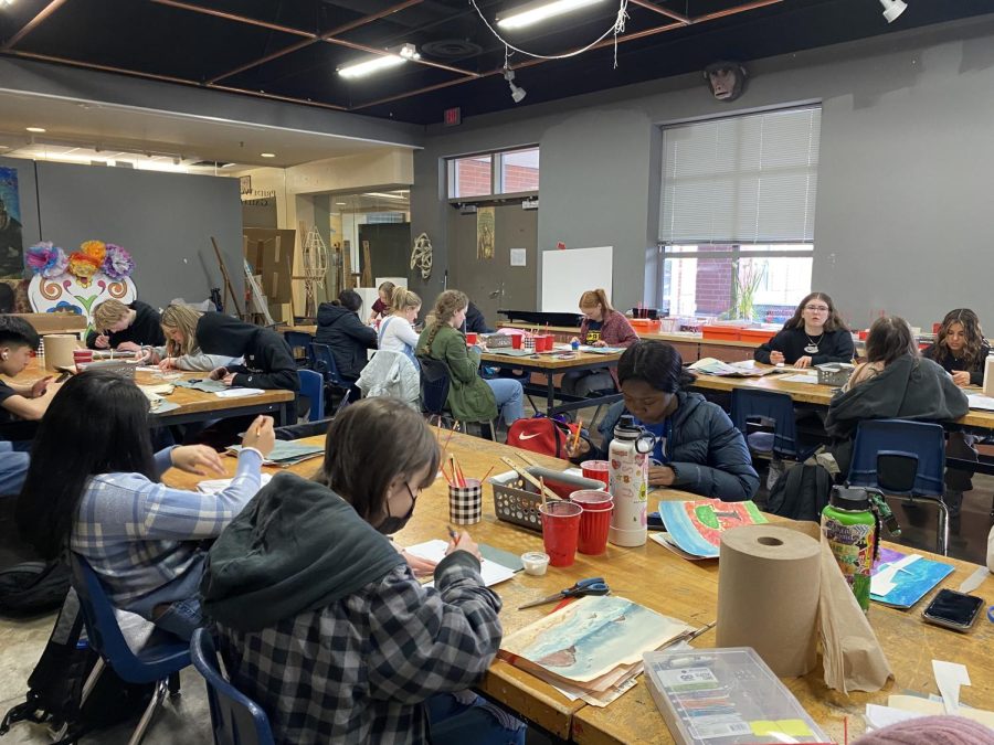 Students work on projects in art class. The arts are filled with students with unique perspectives, and art is one of the many ways to empower these students.