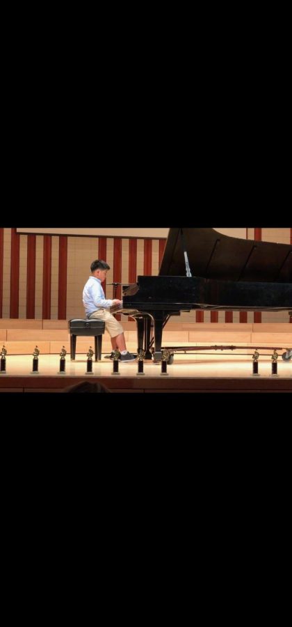 James, when he was age 10, sat promptly on the piano stool in front of many watching, smiling parents. He has grown substantially since, physically and skillfully.