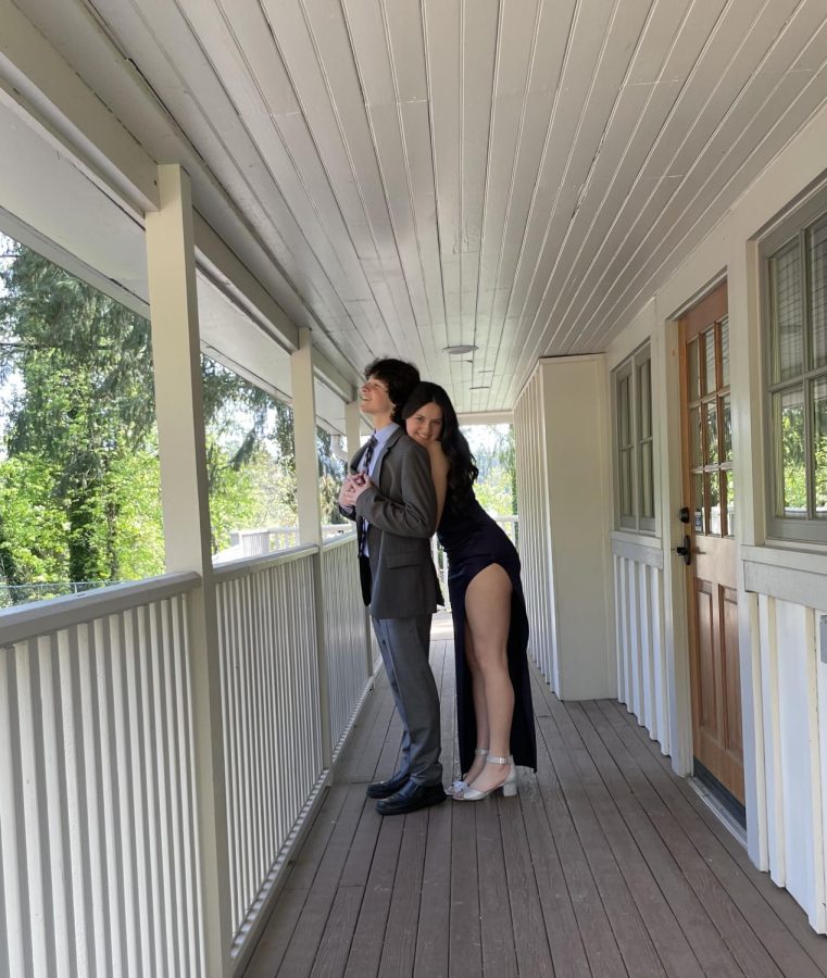 Senior Anna Jardin and her boyfriend/date Teddy Skyler taking pictures and preparing for the prom in 2022. The two are excited to celebrate their second and final prom together this year. Photo provided by Anna Jardin.