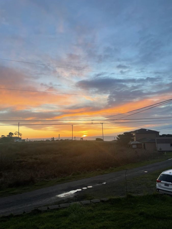 Liza Locke catching sunset views of the Oregon Coast. Locke spent her spring break relaxing with her family by the beach. 