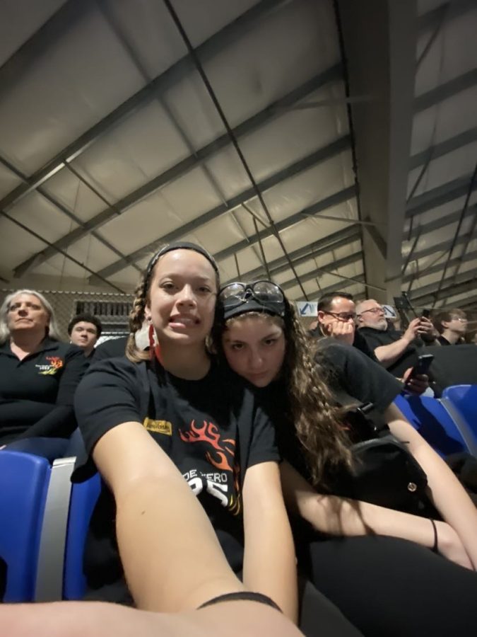 Error Code Xero team members watching their award winning robot. Katelyn LeBlanc (left) and Bianca Pinoli (right) love supporting their team!!