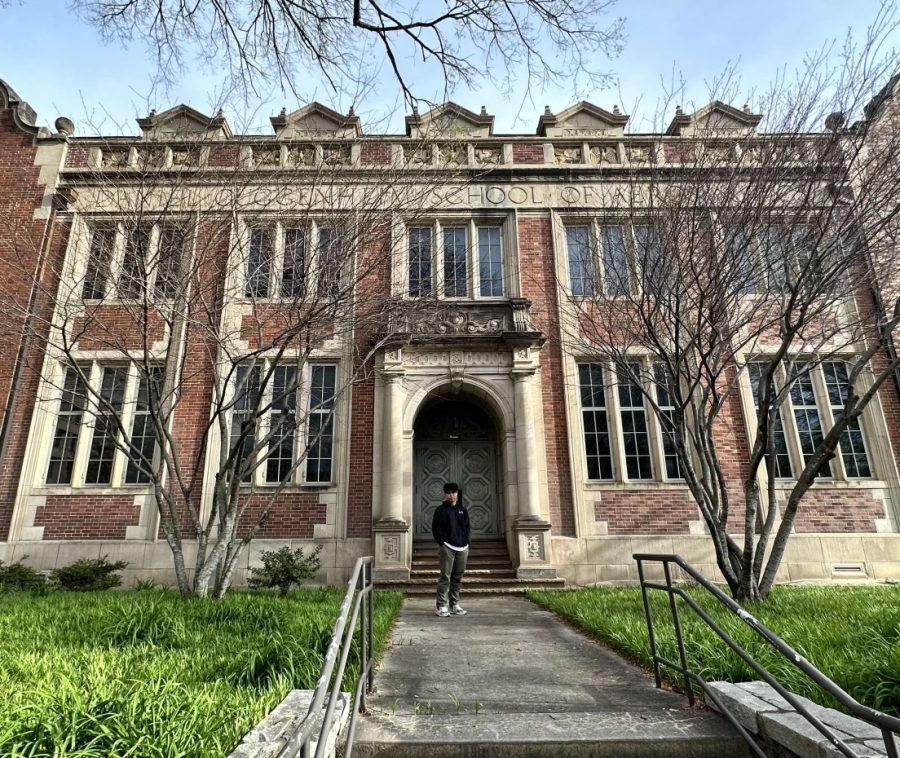 Paul Liu posing in front of a building at Georgia Tech after visiting with a professor. Many juniors use this spring break to tour universities that they are interested in. 