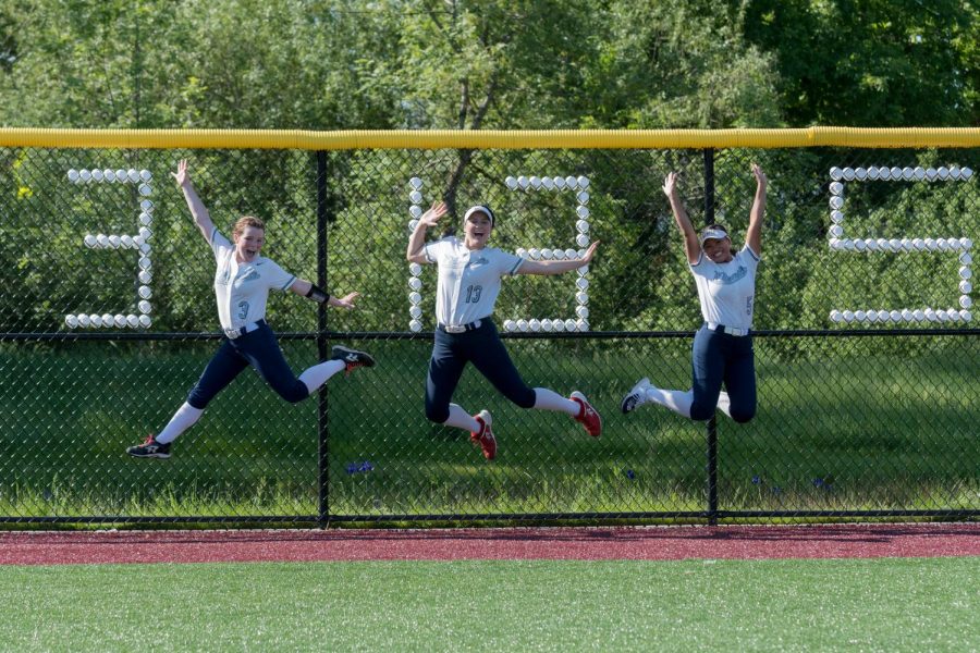 Wildcat seniors pictured above, jumping for joy. They and their teammates are hoping Friday won't be their last game.