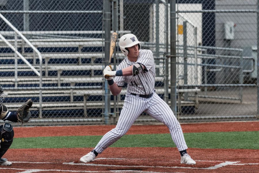 Jacob Ogden swings for an incoming pitch during the team's game agaisnt Canby from April 21. On May 5, Ogden would provide one of the key base hits during their game at Milwaukee.