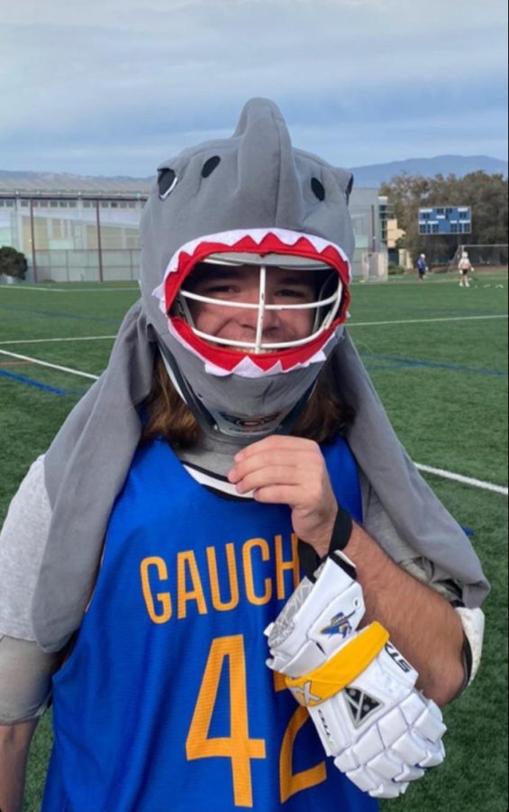 Nolan Rapp shows off his team spirit at halloween practice, decked out in his shark suit. 