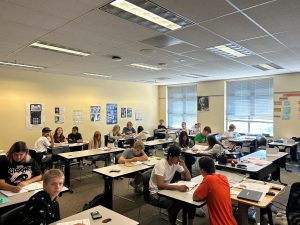 Mr. Reschke has his class work on homework during Life class. It is a common procedure for the second half of life class to serve as study hall time. 