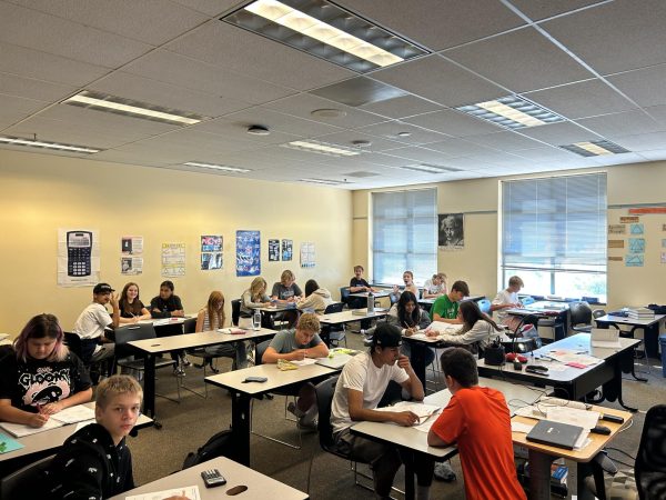 Mr. Reschke has his class work on homework during Life class. It is a common procedure for the second half of life class to serve as study hall time. 