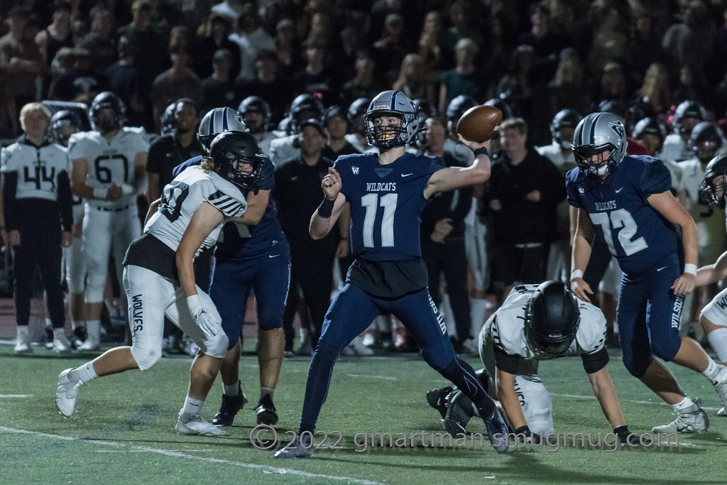 Kallen Gutridge throws a pass in last year's 7-44 loss to Tualatin. Wilsonville looks to get their revenge on Friday. Photo provided by Greg Artman.