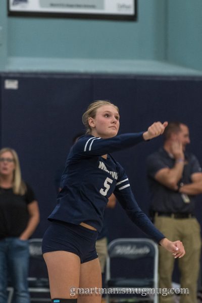 Olivia Lyons gets ready to serve in a win earlier in the season vs. Milwaukie. Lyons is a big part of the Wilsonville team that looks to make a deep playoff run in 2023.
