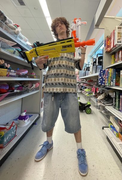 Miller Steinert poses for the camera at the popular Wilsonville Goodwill. Feeling confident about his fire fit, he requested a picture taken.