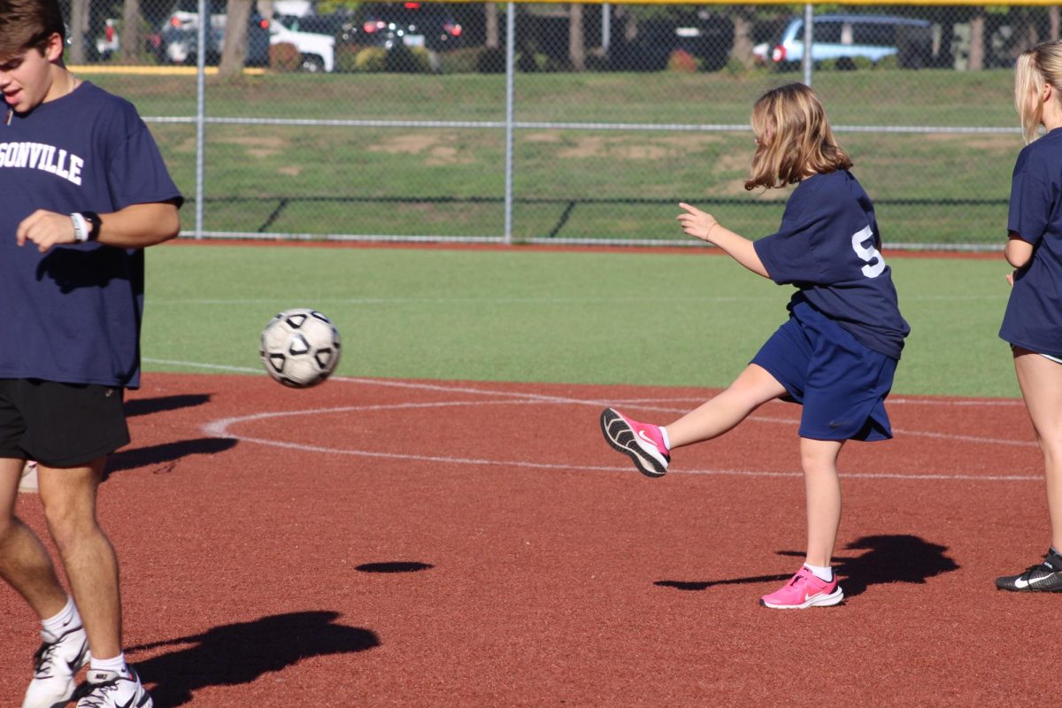 Wilsonville kicks the ball down the field. Wilsonville played West Linn for the first game of the season!