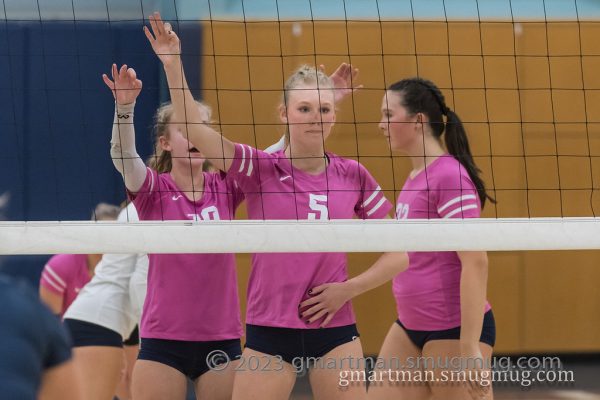 Teagan Hamilton (Left), Olivia Lyons (Middle), Lana Gillas (Right) all prepare for another rally in an earlier game this season. All three of the Wildcats have been key components in leading Wilsonville to the playoffs.