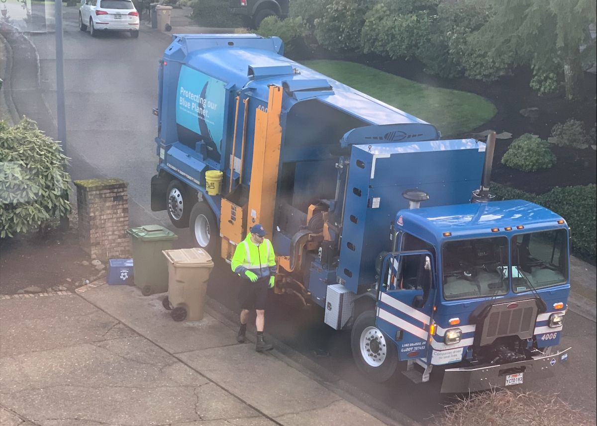 Sally's Republic Services Lake Oswego driver Mike collects residential recycling, glass, motor oil, and household batteries on his route during a run through Palisades, Lake Oswego in March of 2023, a month before Sally's glass bin vanished.