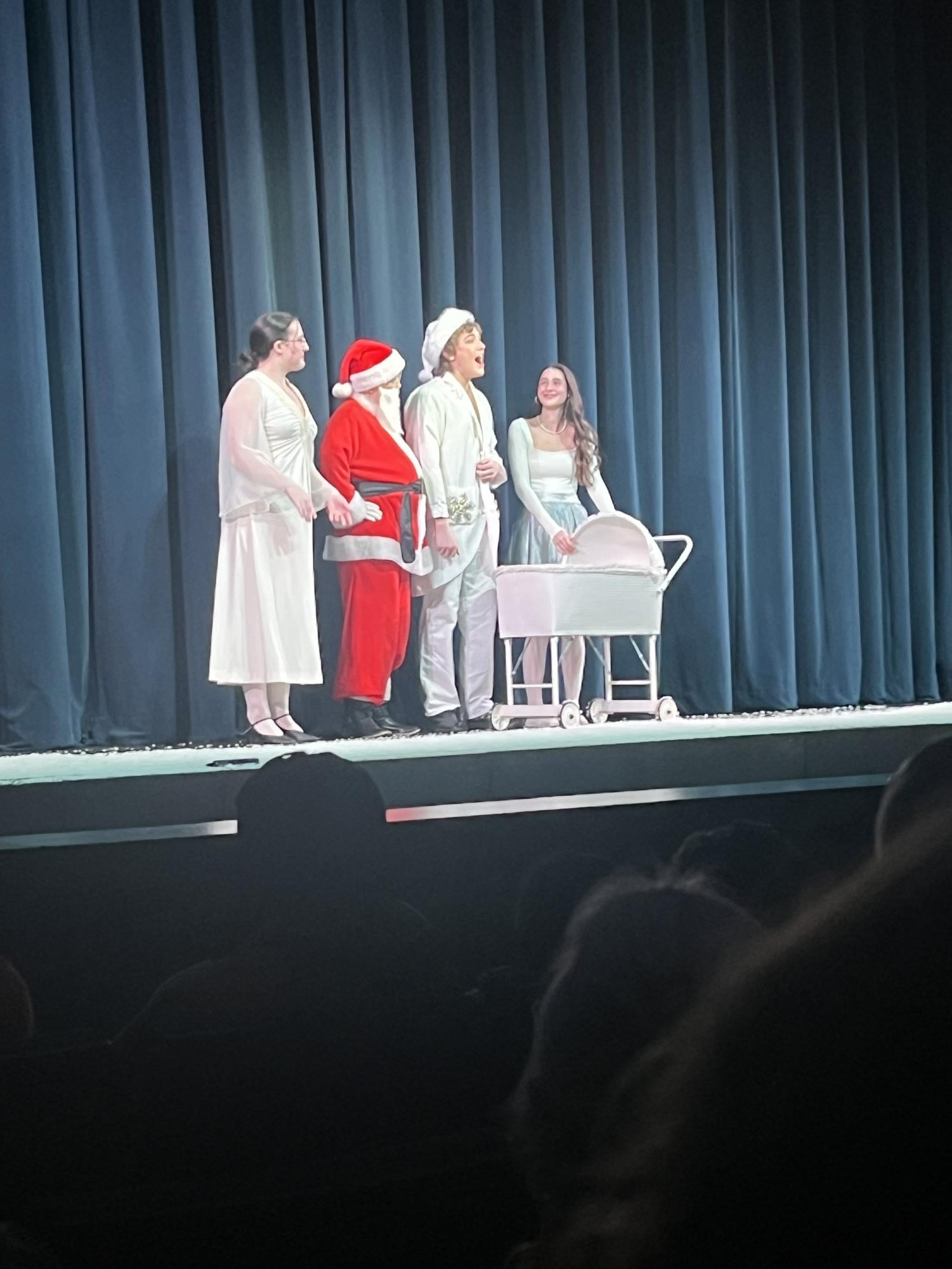 In this scene, the audience discovers that Buddy and Jovie wed. After, the show performed a final dance number.  