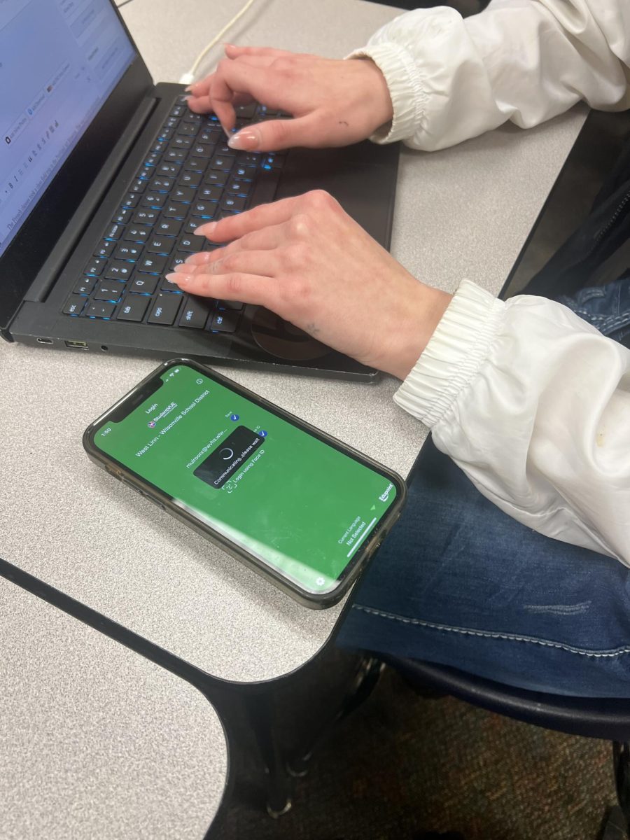 Senior checks their new schedule for the second semester. For some, their schedules changed completely, while others stayed the same. 