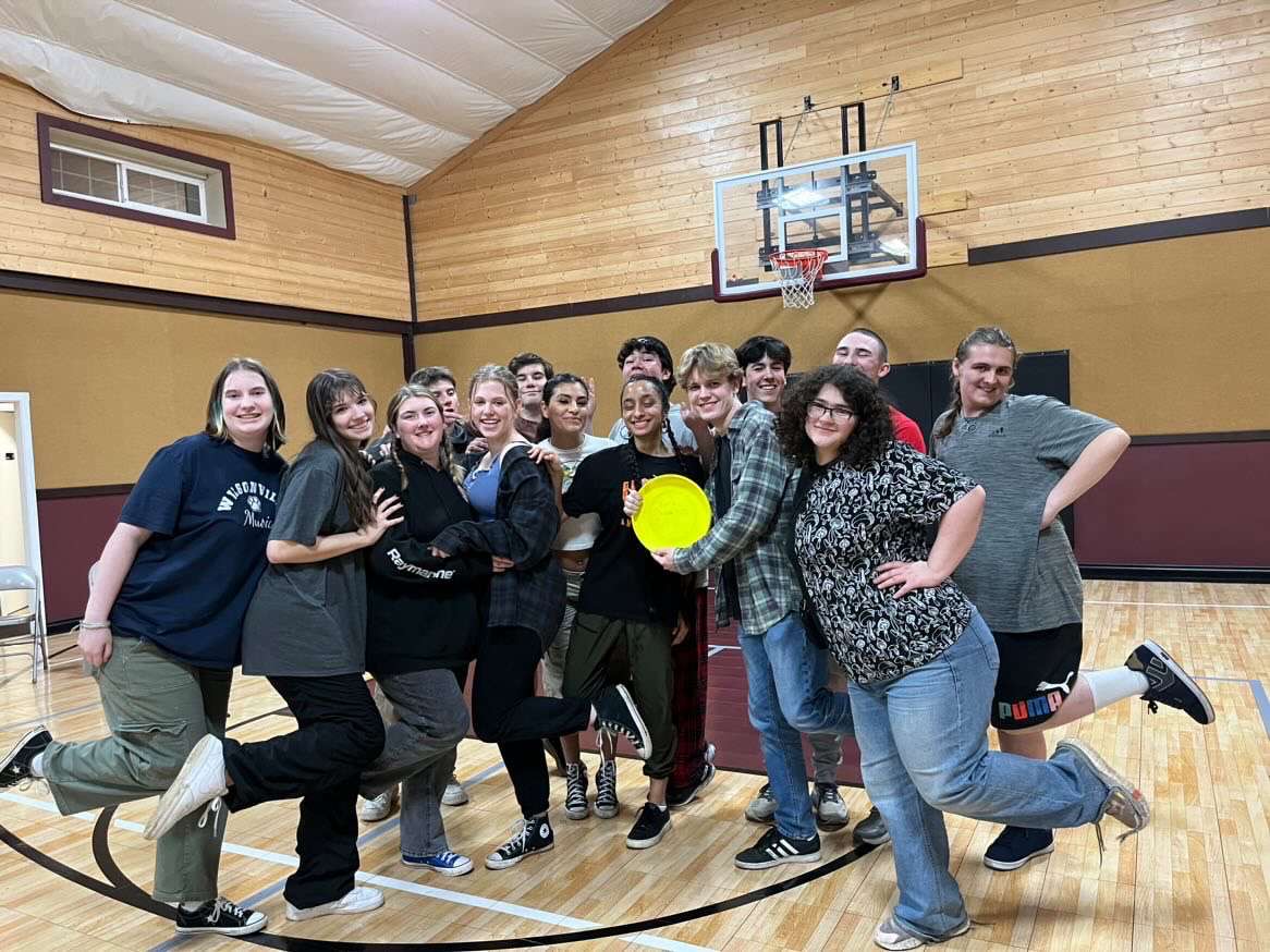 Students who attended the retreat pose for a photo after a bonding activity. Later, the went back to their cabins and finished rehearsals. Photo provided by Venecia Gonzalez.