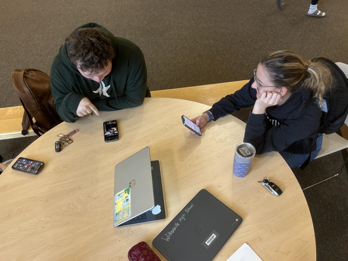 Seniors Kate Gore and Jack Barrett are hanging out at the Point. These seniors should probably be studying, but it's the second semester and senioritis has gotten a hold of them.