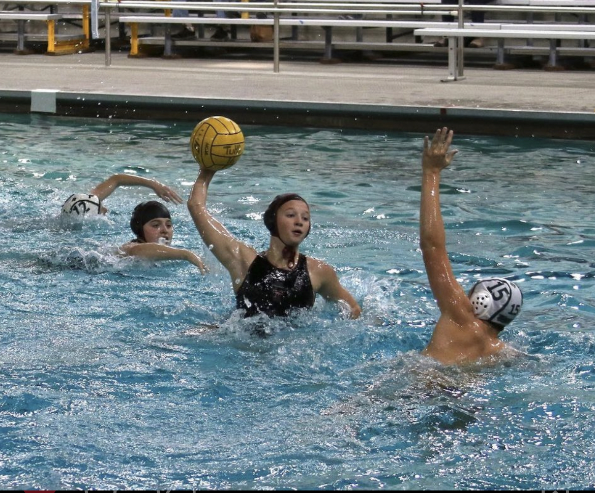 Photo of Carissa Parry freshman year in a home game against Tigard. Tualatin beat Tigard in their boys varsity, girls varsity, and JV games that day. Photo provided by Shelli Ford.
