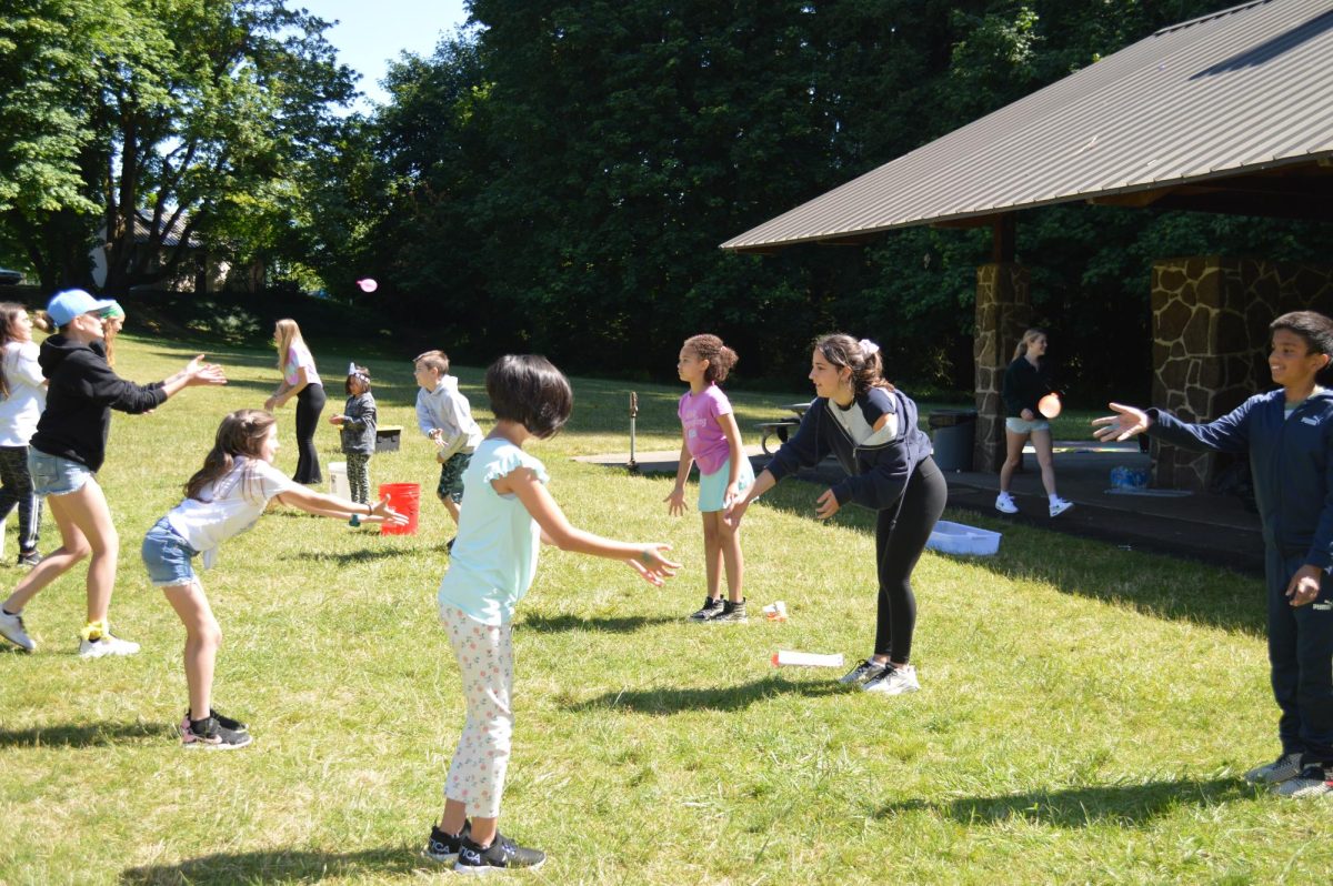 Camper and counselors toss water balloons at last year’s STARS camp. There are many different activities for kids to enjoy throughout the camp! Photo provided by Gabby Maoz.